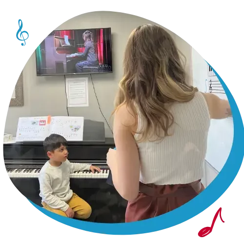 Toronto piano lesson student child with piano teacher