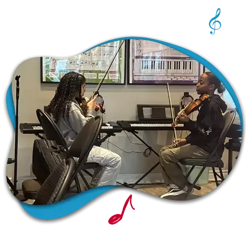 girl having toronto violin lesson in with violin teacher in group class room