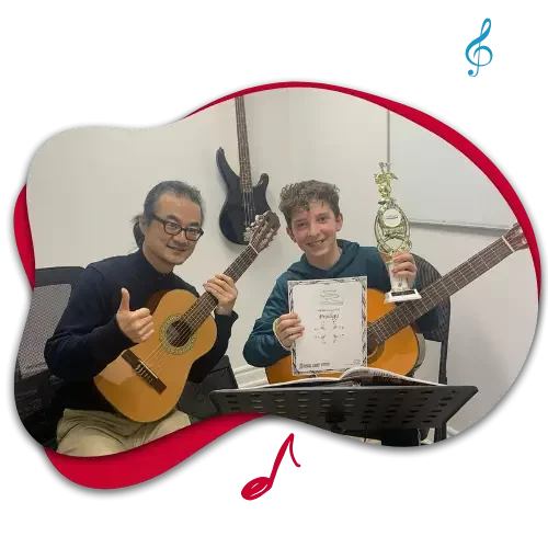 toronto guitar lesson student with guitar teacher