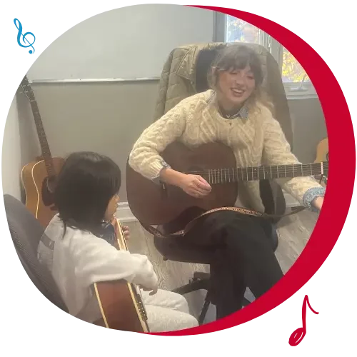 young girl in toronto guitar lesson with guitar teacher